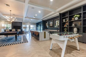 Game room w/ pool table & game table